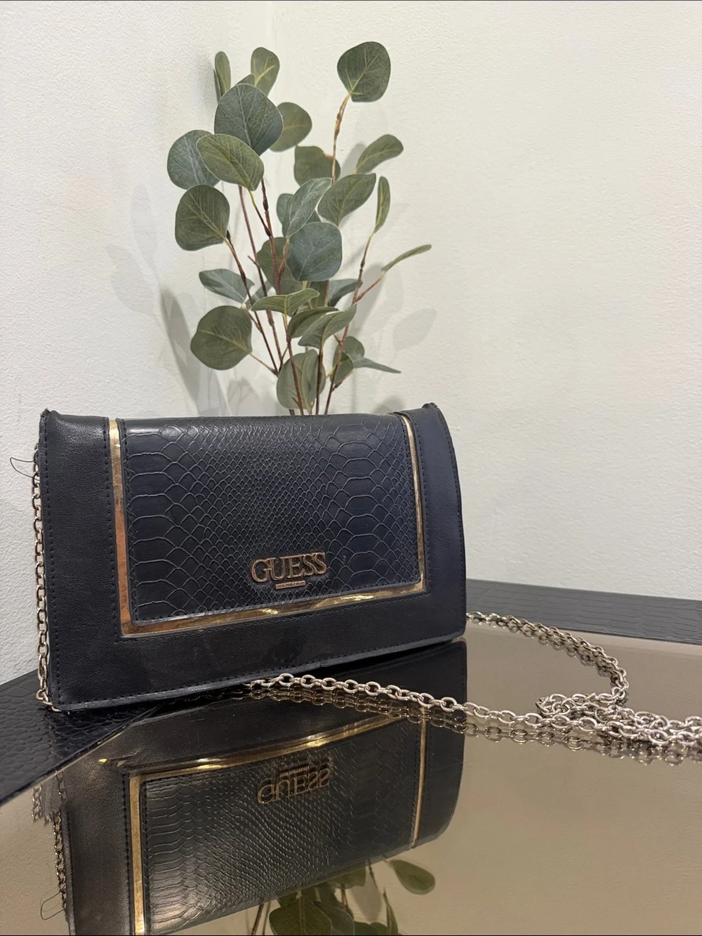 GUESS Black Crossbody Bag with Gold Accents